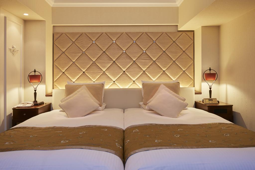 Hotel Okura Tokyo Bay Urayasu Екстер'єр фото A bedroom at the hotel